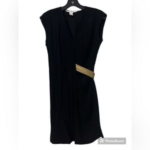 Barely worn DVF gorgeous black dress with gold detail. Size 2